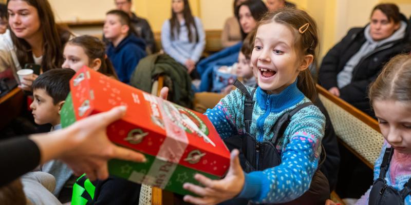 Girl excited to receive shoebox