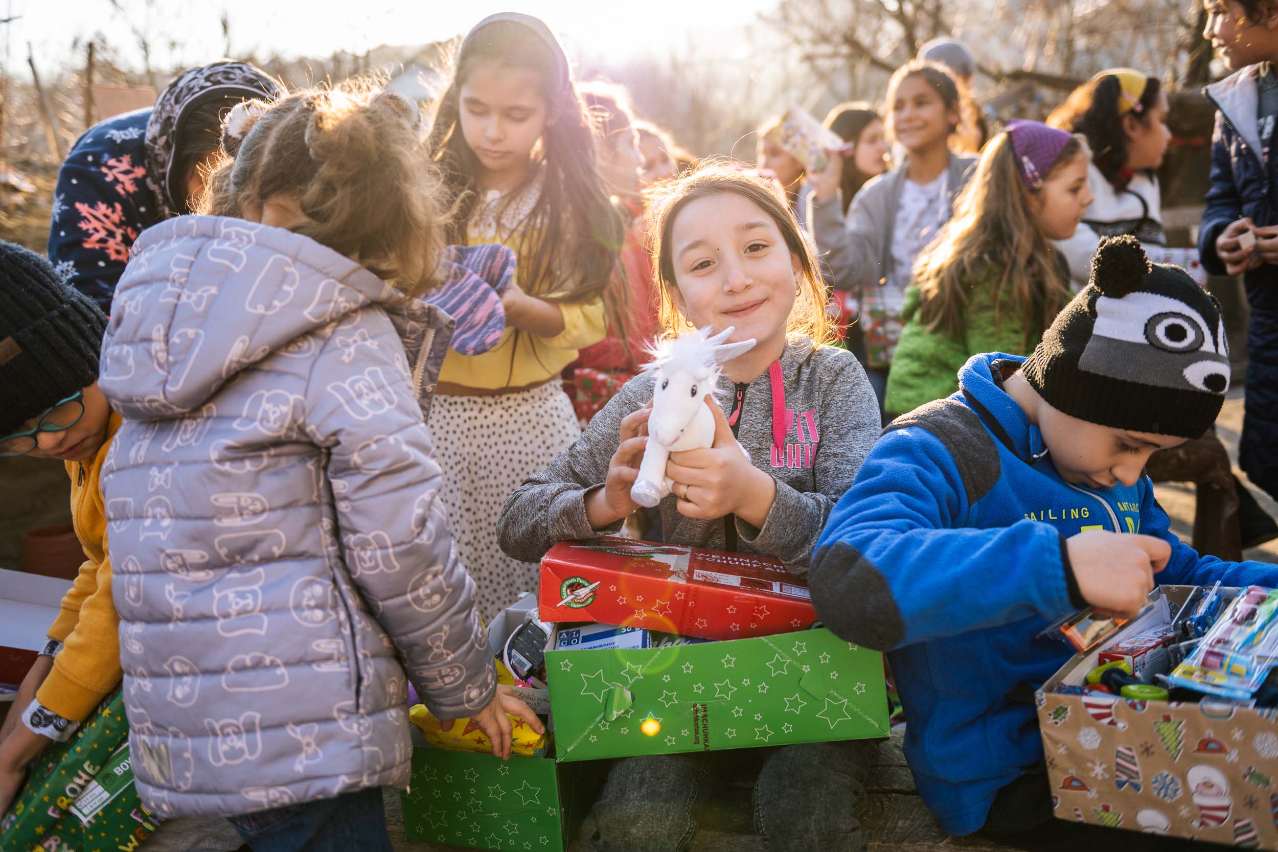 children in Romania with their shoebox gifts