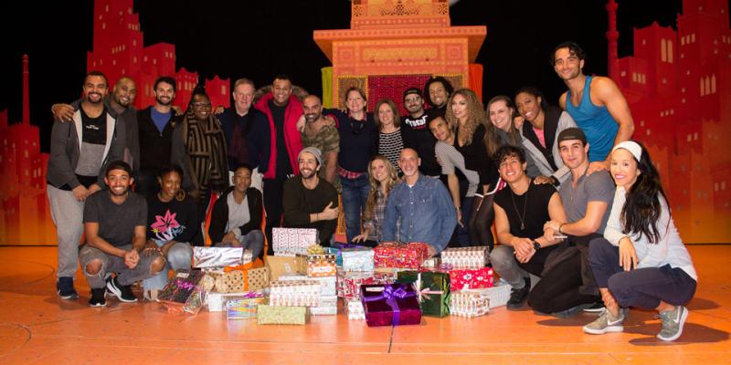 The cast of Aladdin pack shoebox gifts