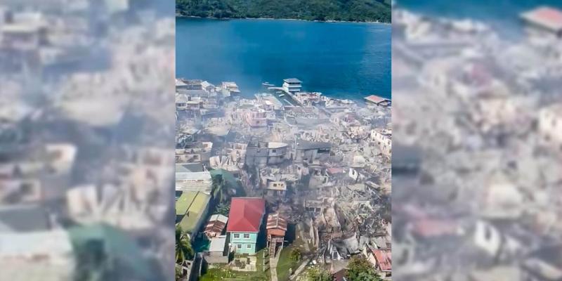 The day after the fire was contained, a view from a helicopter reveals extensive damage.