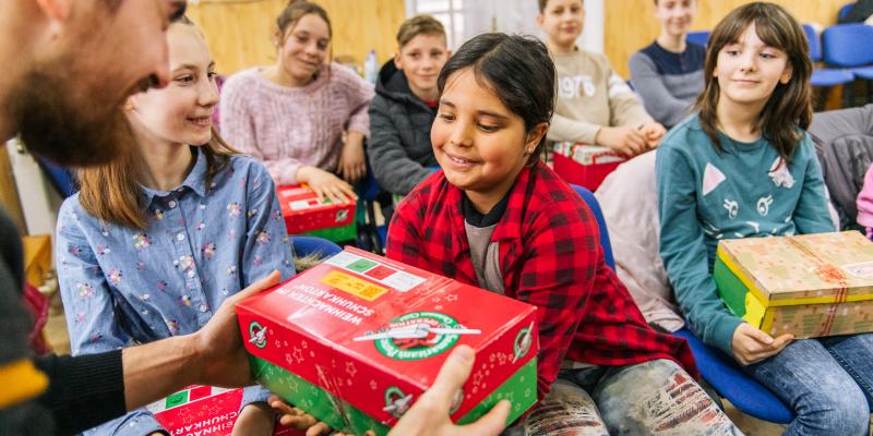 girl receiving shoebox gift