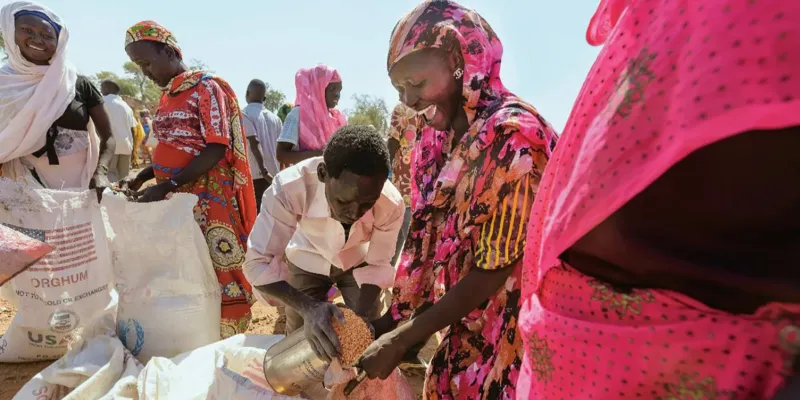 Women excited to receive food items