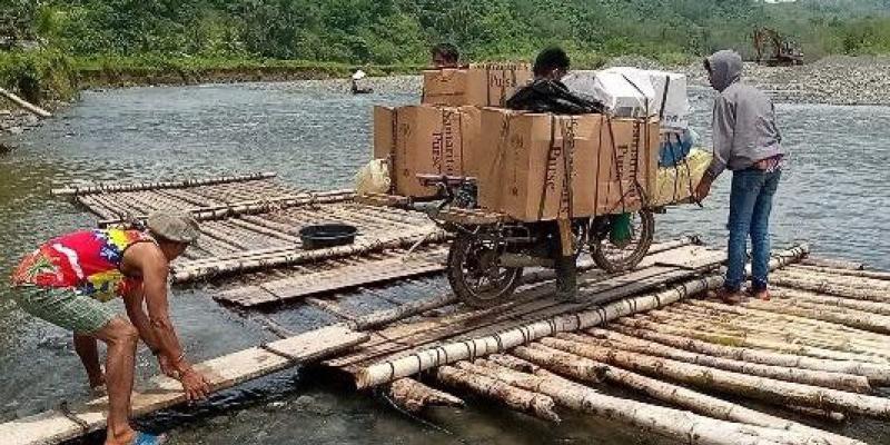 The team had to ford rivers in their journey to the remote mountainous village.