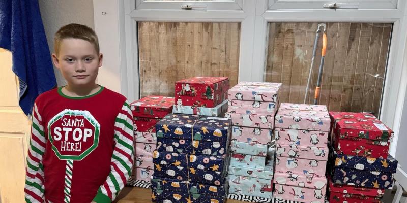 Archie with his 20 shoebox gifts