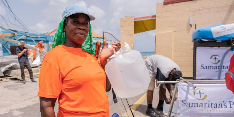 LUCY CLEMENT IS GRATEFUL FOR CLEAN DRINKING WATER FROM OUR FILTRATION SYSTEM AND FOR GOD’S PROTECTION SPARING HER AND HER FAMILY.