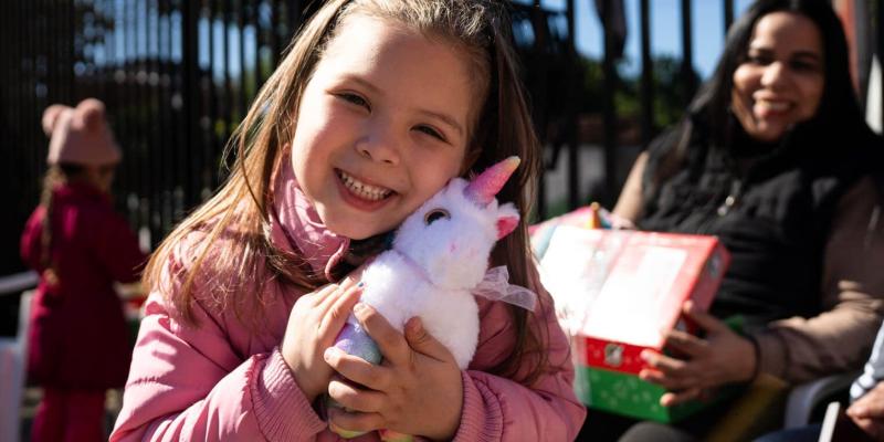 Dolata's jaw dropped when she saw a unicorn stuffed animal in her shoebox gift. She adores unicorns, and even has a matching unicorn backpack.