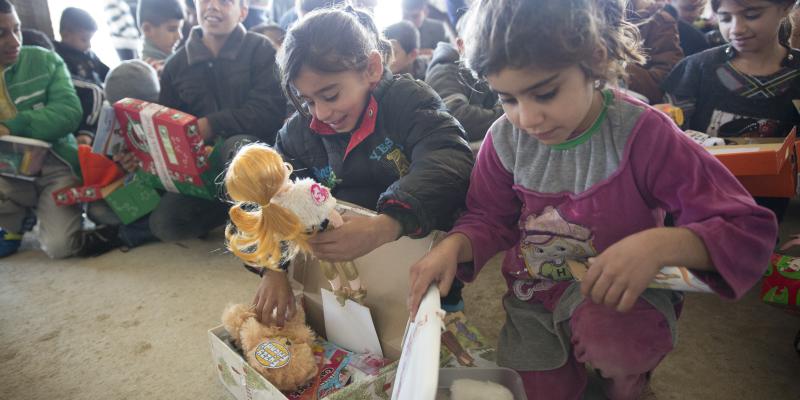 This sweet girl couldn’t contain her smile as she discovered a doll in her shoebox. 