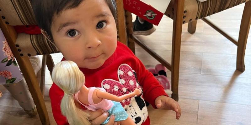 This precious little one loved her new doll!