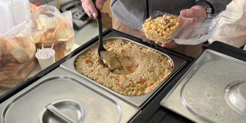 The warming centres offer meals that warm bellies as well as the soul as people linger around the tables with Billy Graham Evangelistic Association chaplains.