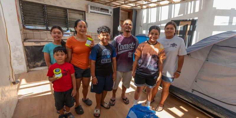 The Crisostomo family set up tents in their kitchen as temporary accommodation after the storm.