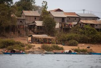 Cambodia huts and river