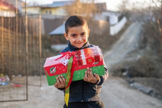 boy with shoebox gift