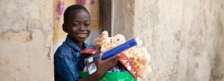 Boy with shoebox gift