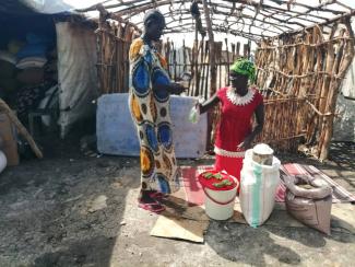 Nyalong was able to open a small shop for selling vegetables and staple crops in her village.