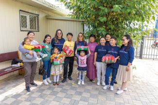 HEART PATIENTS WITH THEIR OPERATION CHRISTMAS CHILD SHOEBOX GIFTS.