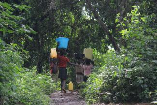 TO ACCESS WATER, MANY FAMILIES IN THE COUNTRY’S MANY RURAL AREAS ARE REQUIRED TO MAKE TRIPS INTO THE BUSH. THIS OFTEN MEANS CHILDREN NEED TO MAKE THESE TRIPS FOR THE DAY’S WATER SUPPLY.