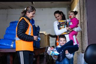 FAMILIES RECEIVE MUCH-NEEDED SUPPLIES FROM SAMARITAN’S PURSE.