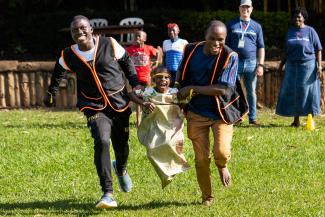 CAMPERS ENJOY SACK RACES AND OTHER GAMES AT HEART CAMP.