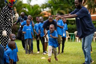 FACE PAINTING AND OUTDOOR GAMES ARE ENJOYED BY THE BOYS AND GIRLS AT HEART CAMP.