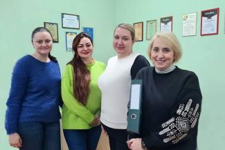 NATALIYA (SECOND FROM LEFT) AND HER TEAM WORK HARD TO MINISTER TO THEIR FELLOW UKRAINIANS WHO ARE IN HARM’S WAY.