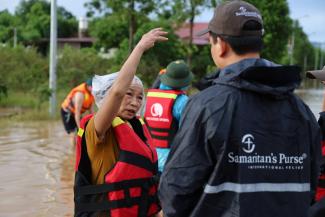 Phuong, left, is one of the many Yen Bai residents to receive a lifejacket as part of our initial response to Typhoon Yagi.