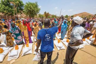 OUR STAFF distributed food to people on the brink of starvation.