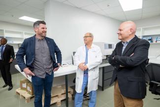 Edward Graham talks with Dr. Russ White, chief of surgery at Tenwek, and Scott Hughett, director of World Medical Mission.