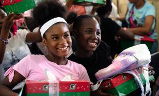 After living through Hurricane Beryl’s destruction a year ago, girls on Grenada’s the island of Carriacou delight to receive a gift-filled Operation Christmas Child shoebox.