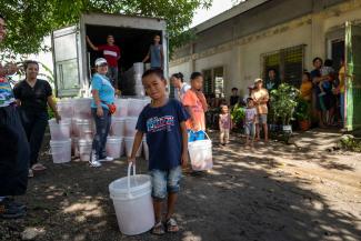 We are distributing supplies in buckets, which are useful for many other applications in disaster situations.