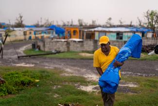 The Samaritan’s Purse shelter tarp provided Derick a dry place to sleep after his roof was torn away. It could be many weeks before he’ll be able to rebuild what Melissa destroyed.