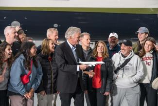 Samaritan’s Purse and Liberty University leaders celebrate the final mission of the DC-8 alongside students and team members. The historic aircraft—retired after a decade of humanitarian service—will be donated to Liberty University to support its nationally recognized School of Aeronautics.
