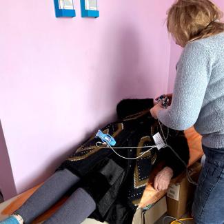 A Mobile Medical Unit assists Hanna with her cardiovascular issues.