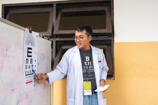 OUR TEAM did vision screenings before surgery.