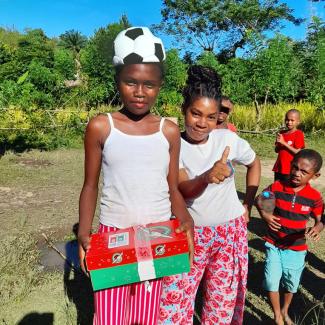 The fun, full, and personalised shoebox gifts the children received softened their hearts to the message of God’s love.