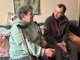 A Billy Graham Evangelistic Association chaplain encourages Maria.