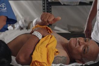 As Jose was helping with search and rescue after the quakes, one of a thousand aftershocks hit, injuring his leg. He was treated at our field hospital.