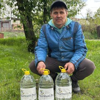 For Michael, the bottles of clean water from Samaritan’s Purse have become a symbol of life and God’s faithfulness.