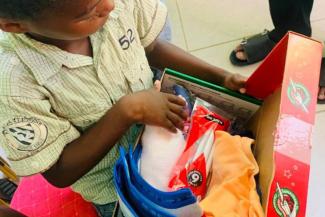 This young boy is among the over 730,000 children in Gabon who have received a gift-filled shoebox given in Jesus’ Name. More than 329,000 of these boys and girls have also participated in 12 lessons of follow-up discipleship through The Greatest Journey.