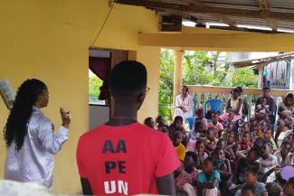 Children in Gabon listen attentively as church members present the Gospel using materials from Samaritan’s Purse.