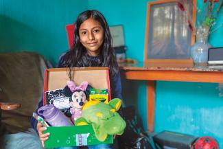 GOD used a shoebox gift to transform Olivia’s life.