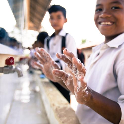 boy washing hands